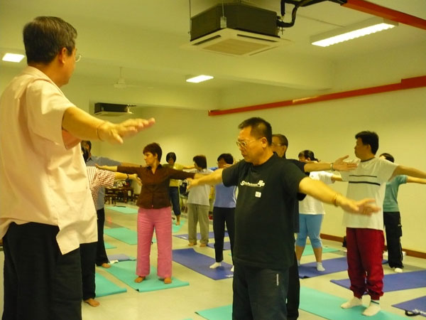 Master Tan conducting  
Qigong training